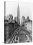View of Empire State Building Beyond Elevated Train Tracks-null-Stretched Canvas