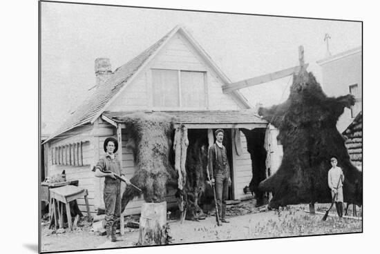 View of Family with Bear Skins - Alaska-Lantern Press-Mounted Premium Giclee Print