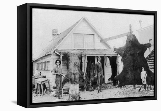 View of Family with Bear Skins - Alaska-Lantern Press-Framed Stretched Canvas