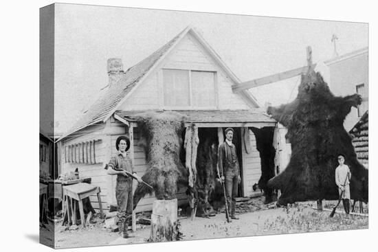 View of Family with Bear Skins - Alaska-Lantern Press-Stretched Canvas