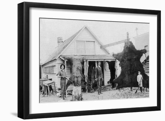 View of Family with Bear Skins - Alaska-Lantern Press-Framed Art Print