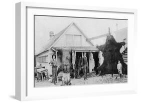 View of Family with Bear Skins - Alaska-Lantern Press-Framed Art Print