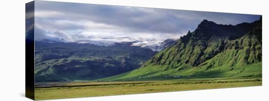 View of Farm and Cliff in the South Coast, Sheer Basalt Cliffs, South Coast, Iceland-null-Stretched Canvas