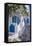 View of girl walking through whitewashed narrow street, Mykonos Town-Frank Fell-Framed Stretched Canvas