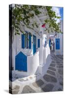 View of girl walking through whitewashed narrow street, Mykonos Town-Frank Fell-Stretched Canvas