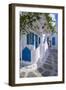 View of girl walking through whitewashed narrow street, Mykonos Town-Frank Fell-Framed Photographic Print