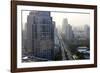 View of High Rise Buildings and Traffic Congestion on Rama Iv in Hazy Evening Light-Lee Frost-Framed Photographic Print