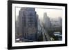 View of High Rise Buildings and Traffic Congestion on Rama Iv in Hazy Evening Light-Lee Frost-Framed Photographic Print