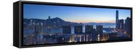 View of Hong Kong Island and Tsim Sha Tsui Skylines at Sunset, Hong Kong-Ian Trower-Framed Stretched Canvas