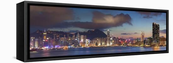 View of Hong Kong Island and Tsim Sha Tsui Skylines at Sunset, Hong Kong-Ian Trower-Framed Stretched Canvas