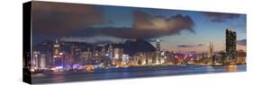 View of Hong Kong Island and Tsim Sha Tsui Skylines at Sunset, Hong Kong-Ian Trower-Stretched Canvas