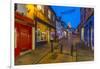 View of illuminated Lincoln Cathedral viewed from the cobbled Steep Hill at dusk, Lincoln, Lincolns-Frank Fell-Framed Photographic Print