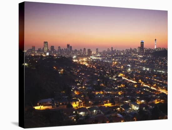 View of Johannesburg Skyline at Sunset, Gauteng, South Africa-Ian Trower-Stretched Canvas