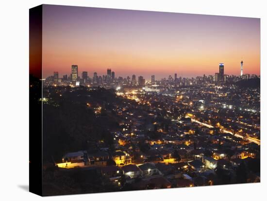 View of Johannesburg Skyline at Sunset, Gauteng, South Africa-Ian Trower-Stretched Canvas