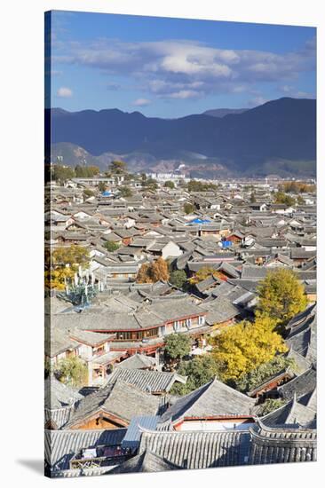 View of Lijiang (UNESCO World Heritage Site), Yunnan, China-Ian Trower-Stretched Canvas