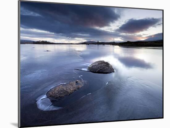 View of Loch Ba' at Dawn, Loch Partly Frozen With Two Large Rocks Protruding From the Ice, Scotland-Lee Frost-Mounted Photographic Print