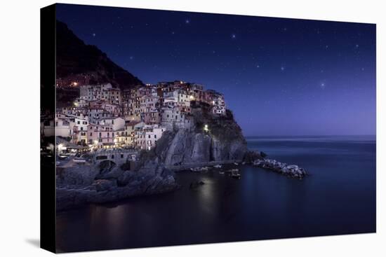 View of Manarola on a Starry Night, La Spezia, Liguria, Northern Italy-null-Stretched Canvas