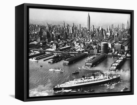 View of New York City Skyline with the S.S. Queen Mary Docking at the 51st Street Pier-null-Framed Stretched Canvas