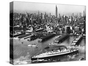 View of New York City Skyline with the S.S. Queen Mary Docking at the 51st Street Pier-null-Stretched Canvas