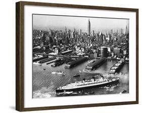 View of New York City Skyline with the S.S. Queen Mary Docking at the 51st Street Pier-null-Framed Photographic Print