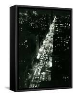 View of New York Illuminated at Night, Traffic Stretches for Miles as Cars Pour into the City-null-Framed Stretched Canvas