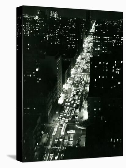 View of New York Illuminated at Night, Traffic Stretches for Miles as Cars Pour into the City-null-Stretched Canvas