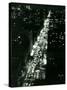 View of New York Illuminated at Night, Traffic Stretches for Miles as Cars Pour into the City-null-Stretched Canvas