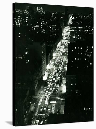 View of New York Illuminated at Night, Traffic Stretches for Miles as Cars Pour into the City-null-Stretched Canvas