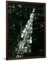 View of New York Illuminated at Night, Traffic Stretches for Miles as Cars Pour into the City-null-Framed Photographic Print