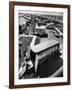 View of Newly Built Houses Jammed Side by Side, Divided by a Street Clogged with Moving Vans-J^ R^ Eyerman-Framed Photographic Print