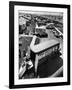 View of Newly Built Houses Jammed Side by Side, Divided by a Street Clogged with Moving Vans-J^ R^ Eyerman-Framed Photographic Print