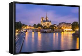 View of Notre Dame De Paris and its Flying Buttresses across the River Seine at Blue Hour, Paris-Aneesh Kothari-Framed Stretched Canvas