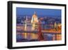 View of Parliament Buildings along Danube River at dusk, Budapest, Capital of Hungary-Tom Haseltine-Framed Photographic Print