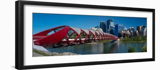 View of Peace Bridge with skylines in the background, Bow River, Calgary, Alberta, Canada-null-Framed Photographic Print