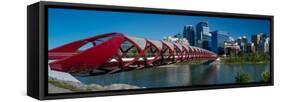 View of Peace Bridge with skylines in the background, Bow River, Calgary, Alberta, Canada-null-Framed Stretched Canvas