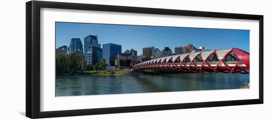 View of Peace Bridge with skylines in the background, Bow River, Calgary, Alberta, Canada-null-Framed Photographic Print