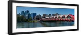 View of Peace Bridge with skylines in the background, Bow River, Calgary, Alberta, Canada-null-Framed Photographic Print
