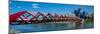 View of Peace Bridge with skylines in the background, Bow River, Calgary, Alberta, Canada-null-Mounted Photographic Print