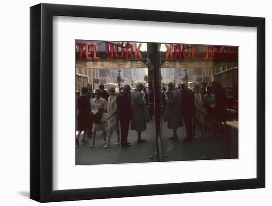 View of Pedestrians Reflected in the Glass of the Hotel York on 7th Ave, New York, New York, 1960-Walter Sanders-Framed Photographic Print