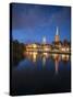 View of Petrikirche from Fussgangerbrucke on Trave Canal-Guido Cozzi-Stretched Canvas