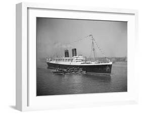 View of S.S. Mauretania with Tugboats-null-Framed Photographic Print