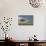 View of savannah habitat with rainclouds, Masai Mara, Kenya-Malcolm Schuyl-Photographic Print displayed on a wall