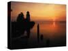 View of Sea and Lighthouse at Sunset, Cheboygan, Michigan, USA-Adam Jones-Stretched Canvas