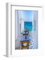 View of sea and restaurant tables in Mykonos Town, Mykonos, Cyclades Islands, Aegean Sea-Frank Fell-Framed Photographic Print