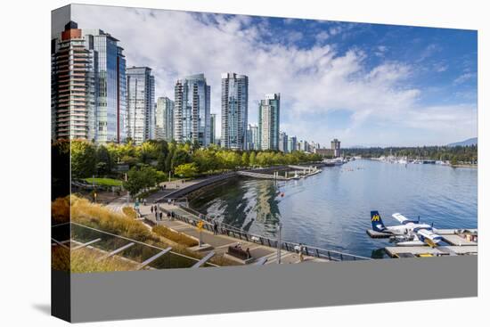 View of seaplane and urban office buildings around Vancouver Harbour, Downtown, Vancouver, British -Frank Fell-Stretched Canvas