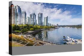 View of seaplane and urban office buildings around Vancouver Harbour, Downtown, Vancouver, British -Frank Fell-Stretched Canvas