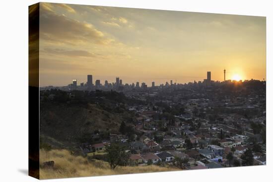 View of skyline at sunset, Johannesburg, Gauteng, South Africa, Africa-Ian Trower-Stretched Canvas