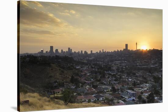 View of skyline at sunset, Johannesburg, Gauteng, South Africa, Africa-Ian Trower-Stretched Canvas