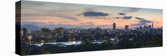 View of Skyline of Coastal Area of Fukuoka at Sunset, Kyushu, Japan-Ian Trower-Stretched Canvas