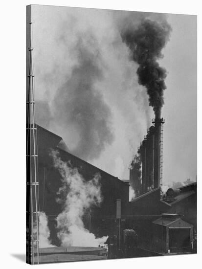 View of Smoke Spewing Plant-null-Stretched Canvas